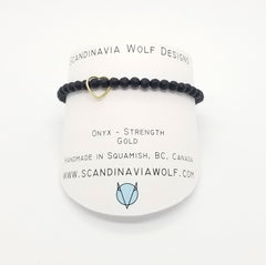 4mm Faceted Matte Onyx with Floating Gold Heart Bracelet