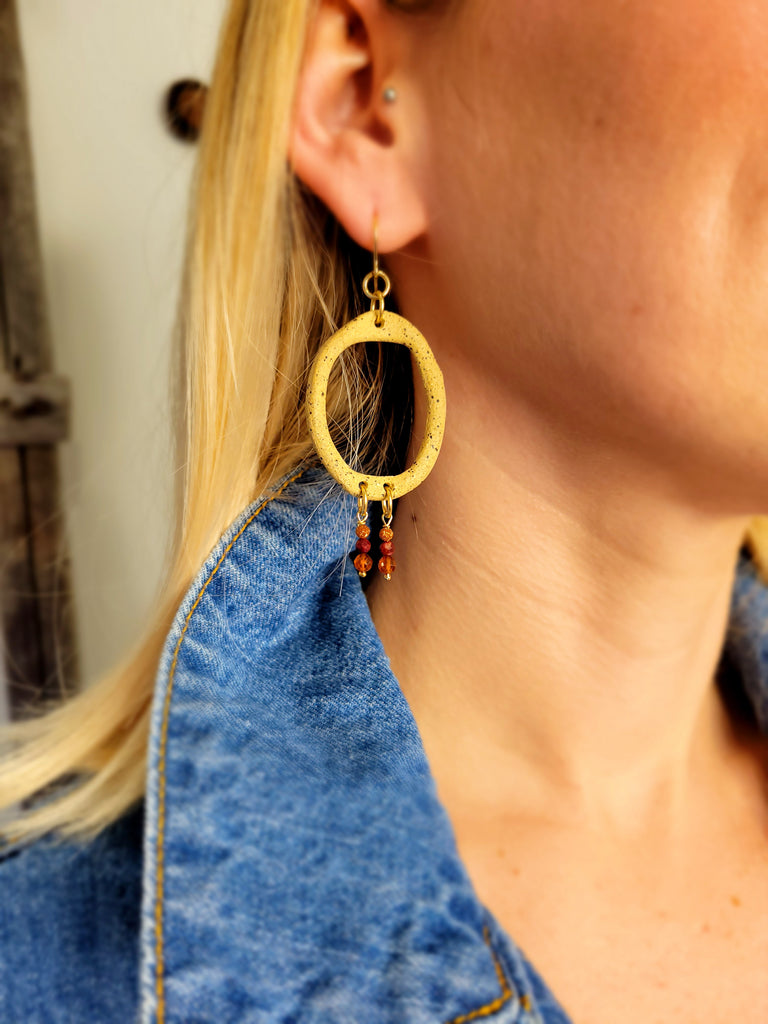 The Lutum Goddess - Asymmetrical Ceramic Garnet Rhodonite Goldstone Gold Hoop Earrings