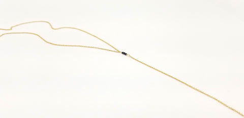 Dash of Black Spinel Gold Center Drop Necklace