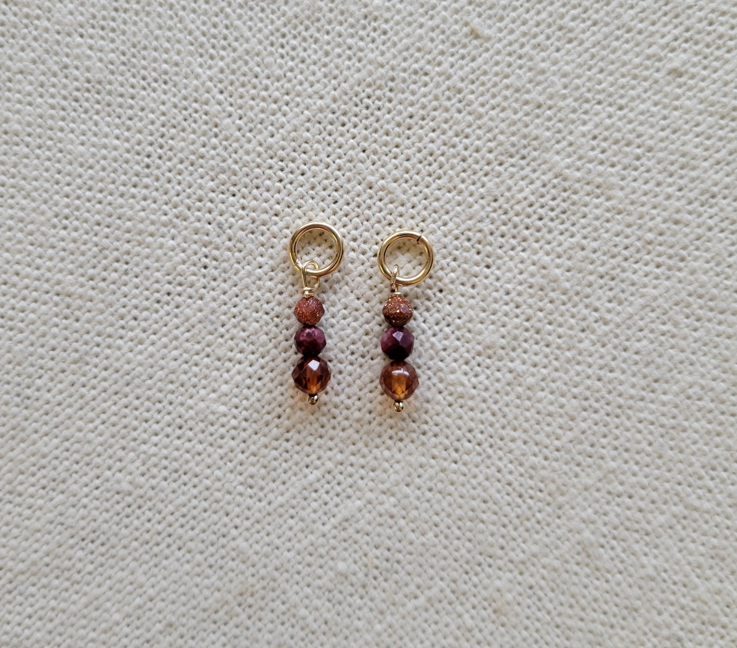 Triple Gem Orange Garnet Rhodonite goldstone Gold Charm (Single)